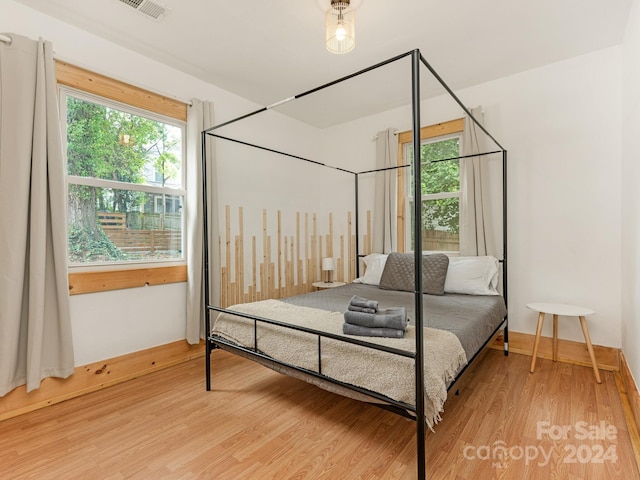 bedroom featuring hardwood / wood-style floors