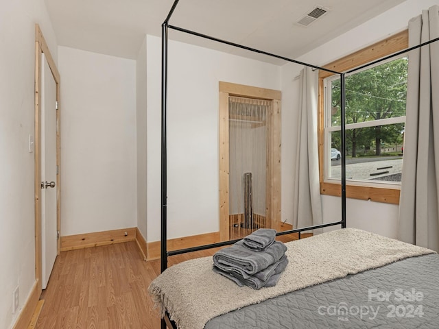 bedroom featuring light hardwood / wood-style floors