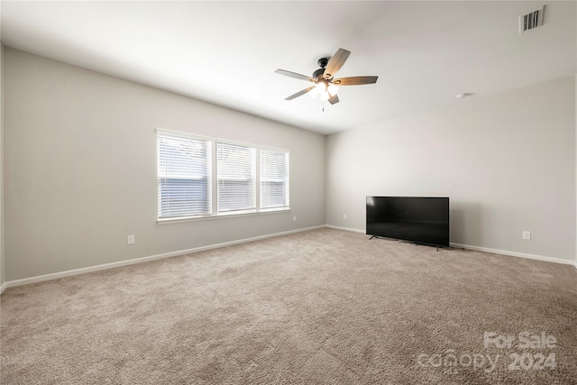 interior space featuring ceiling fan