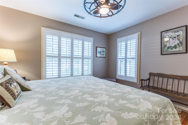 bedroom featuring hardwood / wood-style floors