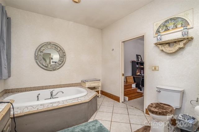 bathroom featuring tiled bath, toilet, and tile patterned floors