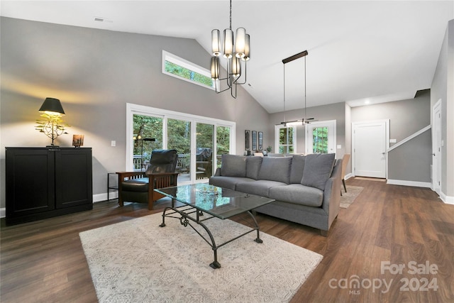 living room featuring high vaulted ceiling, plenty of natural light, and dark wood-type flooring