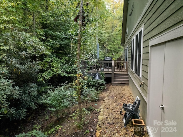 view of yard with a deck