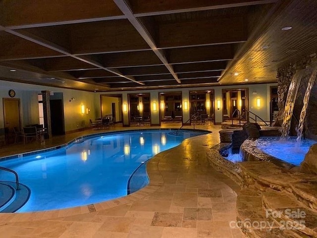 indoor pool with a patio area