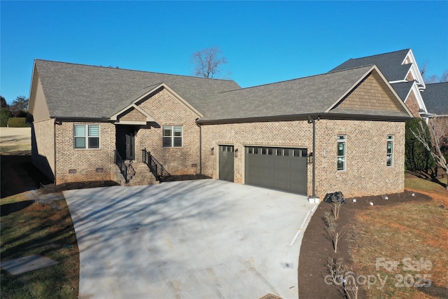 view of front of home featuring a garage, brick siding, concrete driveway, crawl space, and roof with shingles