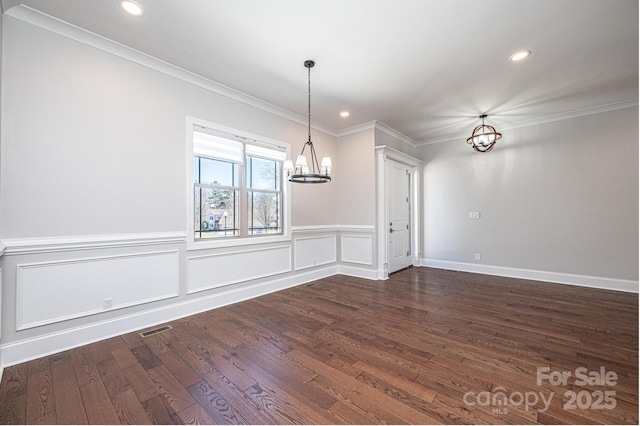 unfurnished dining area featuring a chandelier, ornamental molding, dark wood finished floors, and visible vents