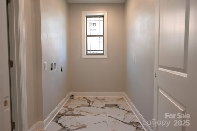 washroom with hookup for a washing machine, hookup for an electric dryer, laundry area, baseboards, and marble finish floor