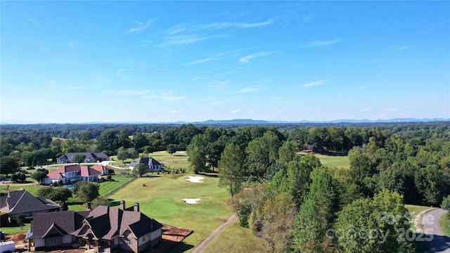 bird's eye view featuring view of golf course and a residential view