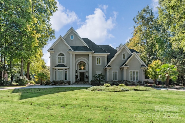 view of front of home with a front yard