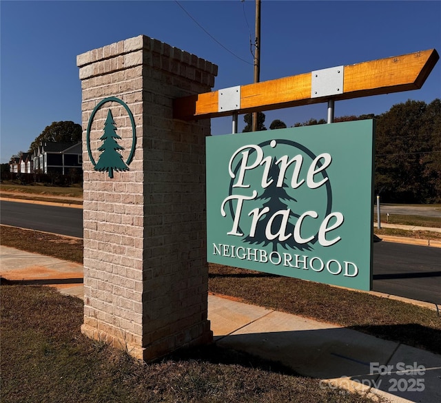 view of community sign