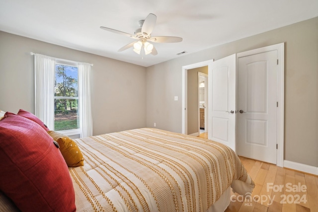 bedroom featuring ceiling fan and light wood-type flooring