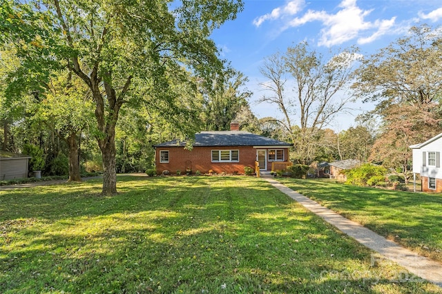 view of front of house with a front yard