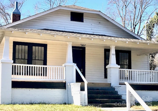 bungalow-style house featuring a porch