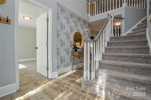 staircase with carpet flooring