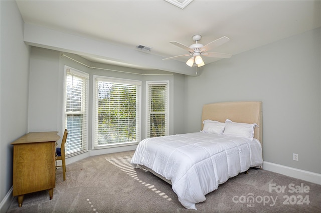 carpeted bedroom featuring ceiling fan