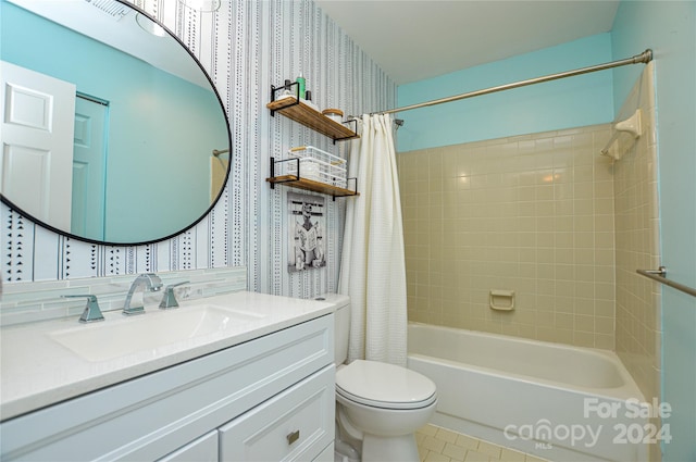 full bathroom featuring tile patterned floors, vanity, shower / bath combo, and toilet