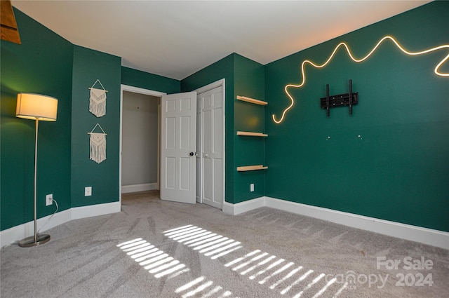 unfurnished bedroom featuring carpet floors