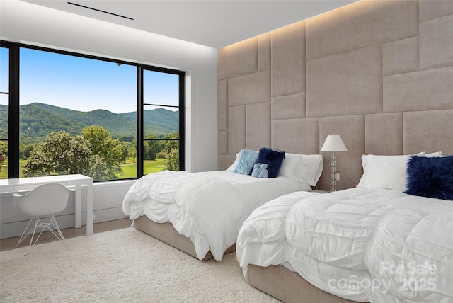 bedroom with a mountain view