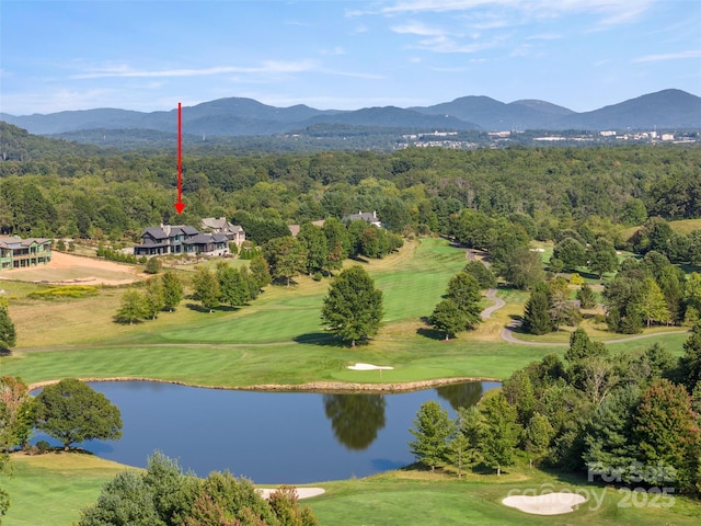 exterior space featuring a water and mountain view