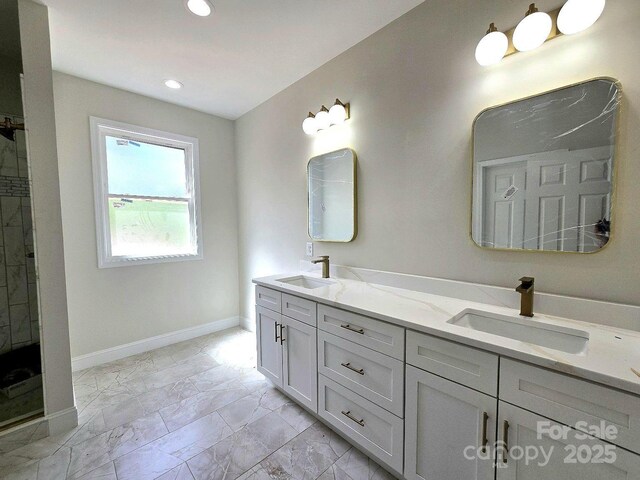 1710 Plantation Loop, Morganton, NC 28655 - full bath with a sink, double vanity, baseboards, and recessed lighting