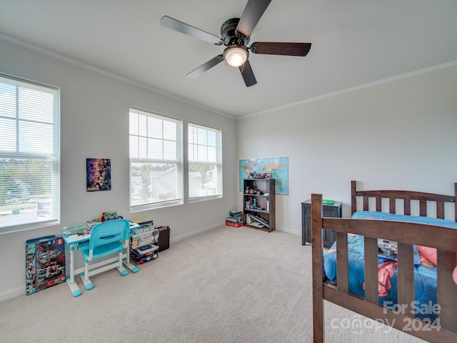 bedroom featuring carpet, ceiling fan, and multiple windows