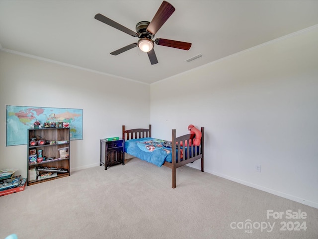 bedroom with ceiling fan, light colored carpet, and ornamental molding