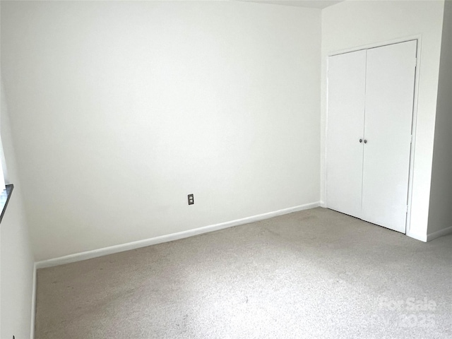 1300 Reece Rd Unit 302, Charlotte, NC 28209 - unfurnished bedroom with carpet flooring and a closet