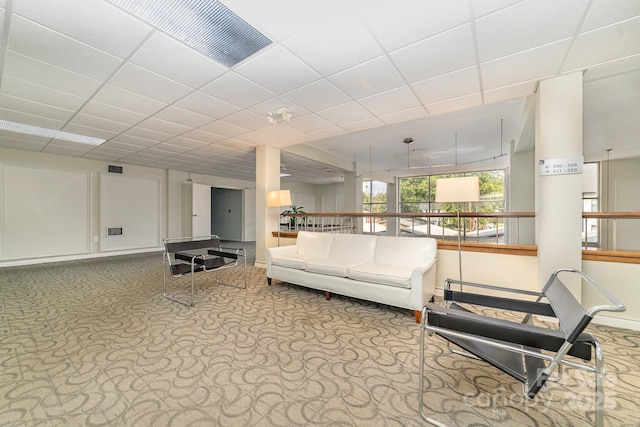 1300 Reece Rd Unit 302, Charlotte, NC 28209 - carpeted living room featuring baseboards
