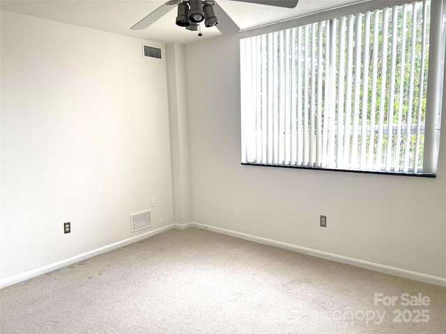 1300 Reece Rd Unit 302, Charlotte, NC 28209 - unfurnished room with carpet and a ceiling fan