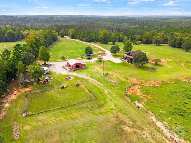 birds eye view of property featuring a rural view