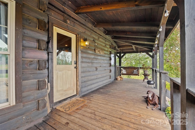 wooden deck with covered porch