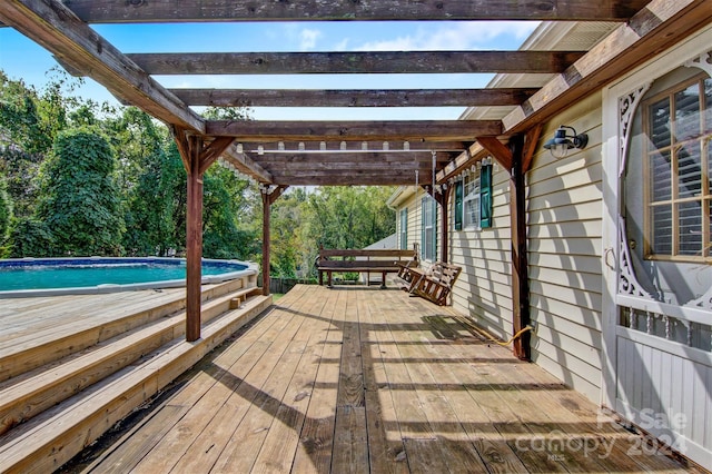 wooden terrace featuring a pergola