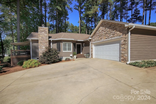 view of front of home with a garage