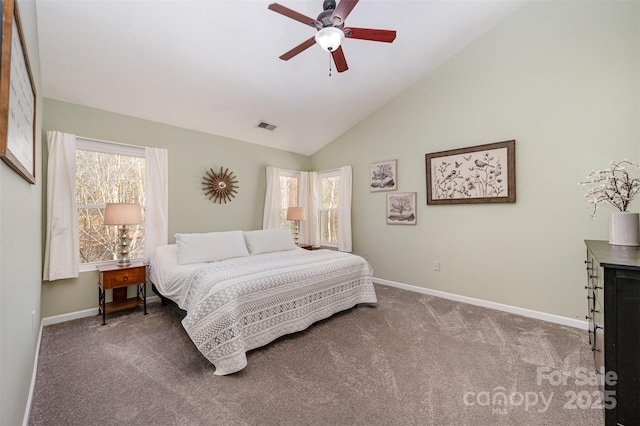 carpeted bedroom featuring lofted ceiling and ceiling fan