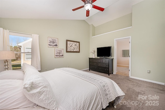 carpeted bedroom featuring vaulted ceiling and ceiling fan