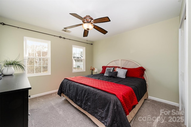 carpeted bedroom with ceiling fan