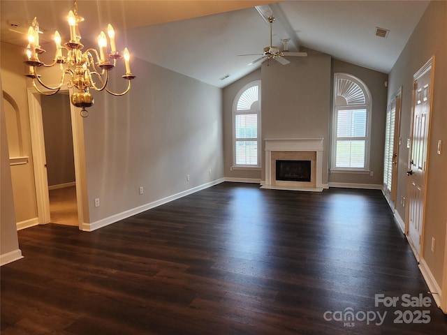 unfurnished living room with visible vents, dark wood finished floors, and ceiling fan with notable chandelier