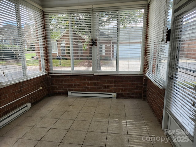 unfurnished sunroom featuring a baseboard radiator