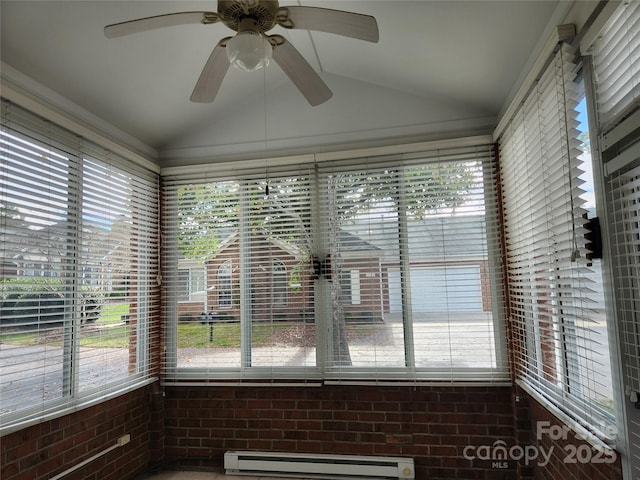 unfurnished sunroom featuring a baseboard heating unit, lofted ceiling, and a ceiling fan