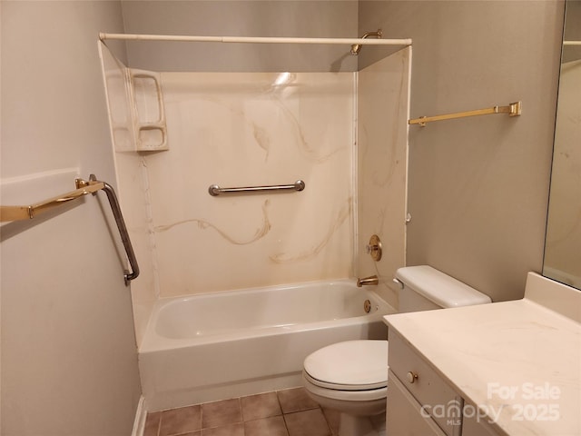 bathroom with tile patterned flooring, toilet, vanity, and shower / bath combination