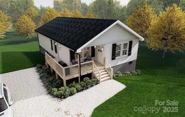 view of front of house featuring a wooden deck and a front yard