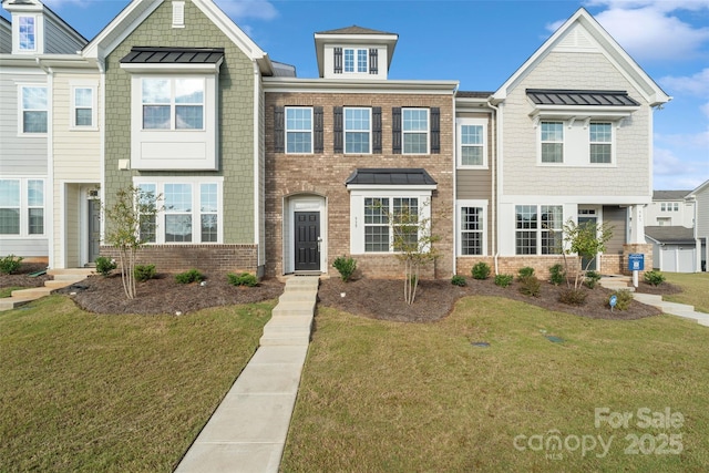 view of property with a front lawn