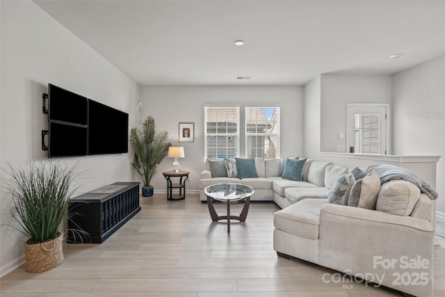 living room featuring light hardwood / wood-style floors