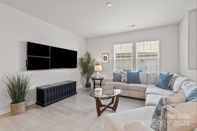 living room featuring light wood-type flooring