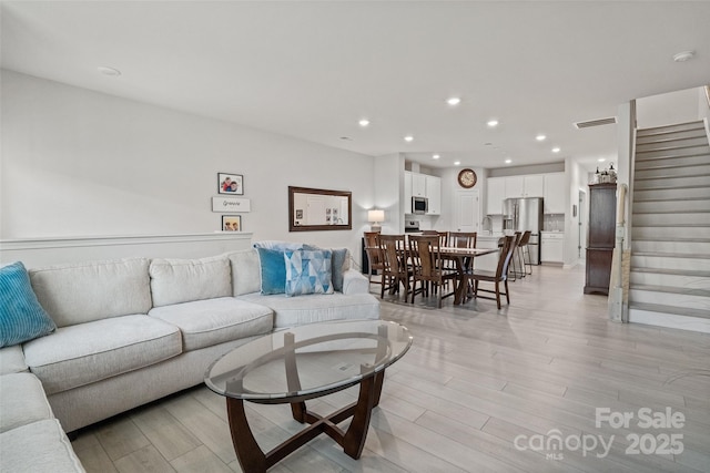 living room featuring light wood-type flooring