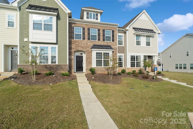 view of property featuring a front lawn