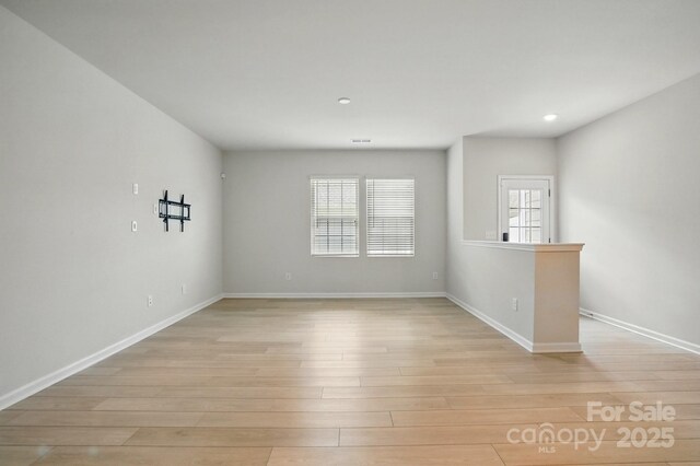 939 Cobbled Way, Fort Mill, SC 29715 - empty room featuring light wood-type flooring, baseboards, and recessed lighting