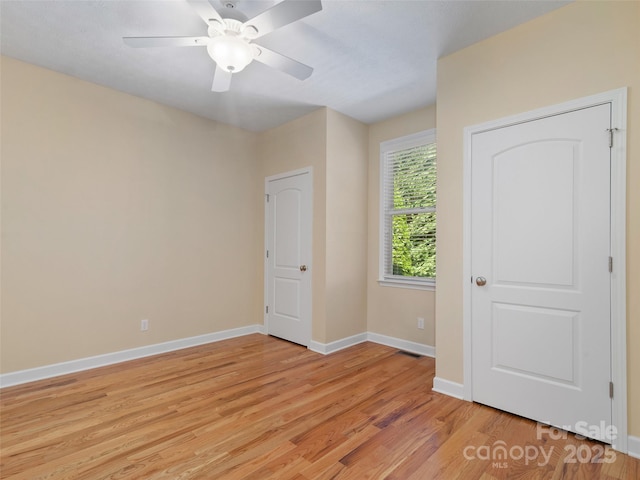 interior space featuring ceiling fan and light hardwood / wood-style floors