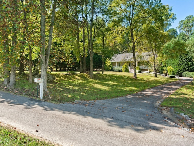 view of front of home with a front yard