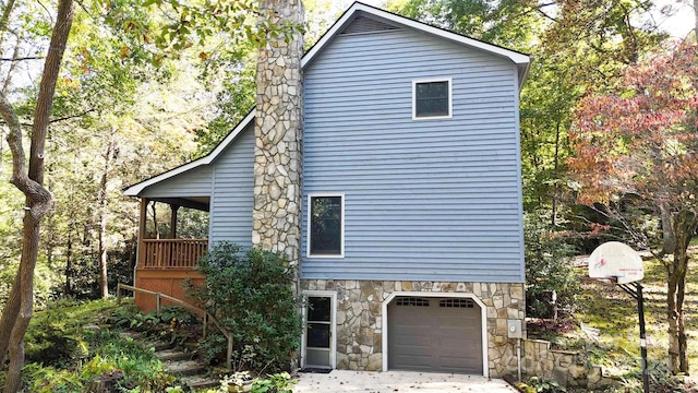 view of property exterior with a garage